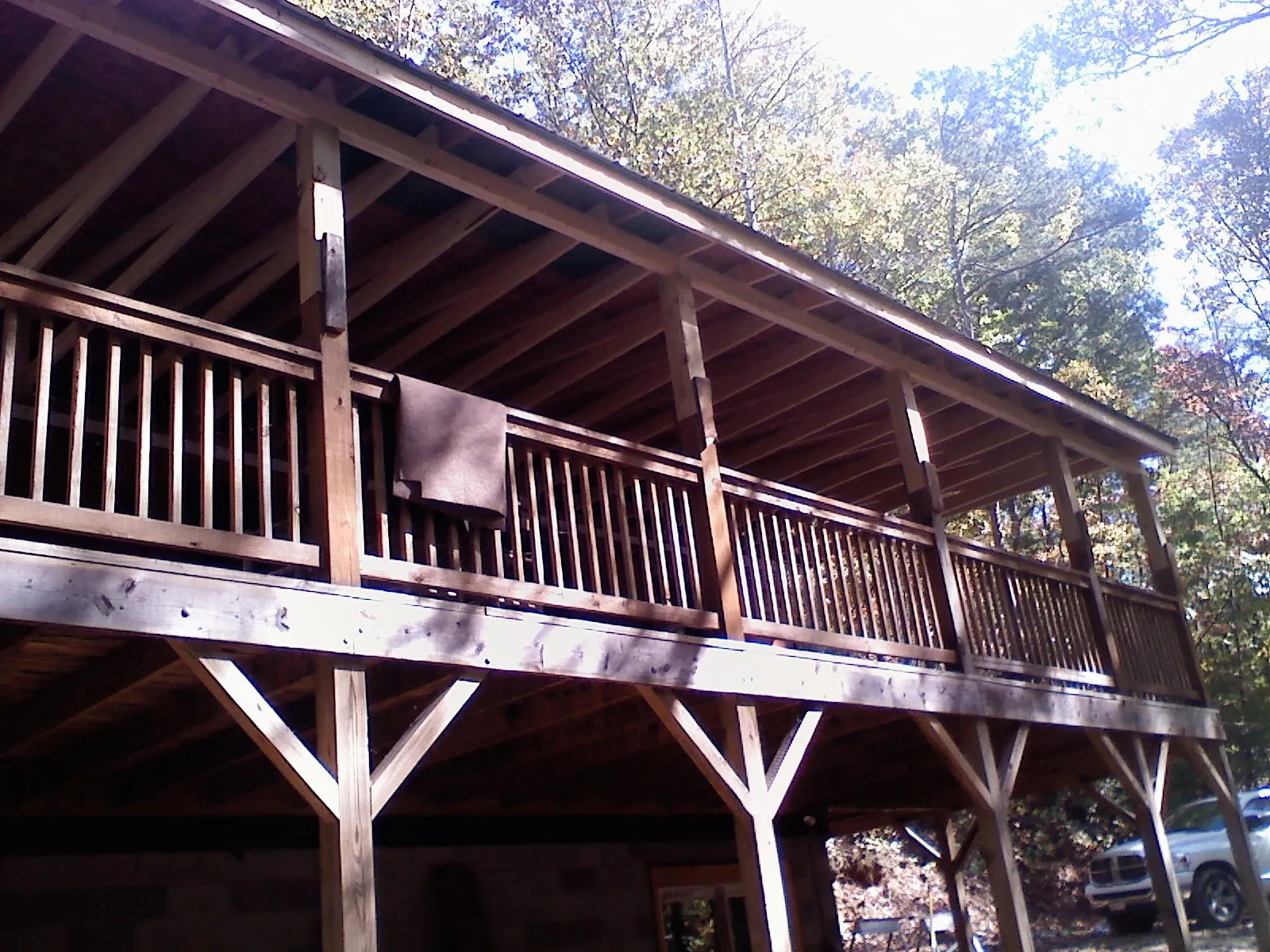 Timber framing under a new elevated porch and deck — Roof Leak Repair in Philomath by Roofing Brothers